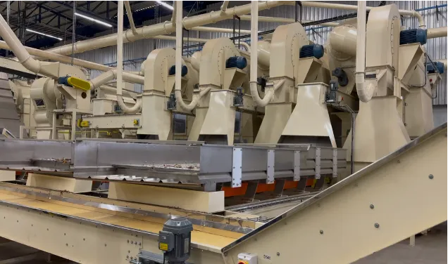 Banks of multi-separators above vibrating conveyors on a threshing line at a SUR Engenharia reference installation